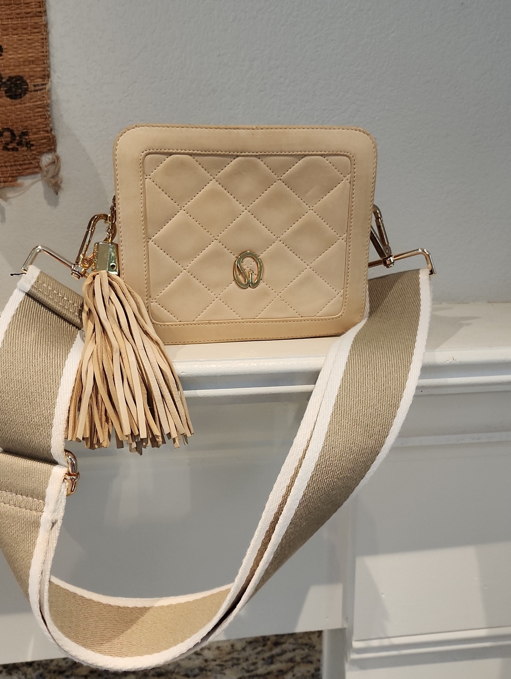 St. John Quilted Cream Crossbody with Tassel and Wide Strap